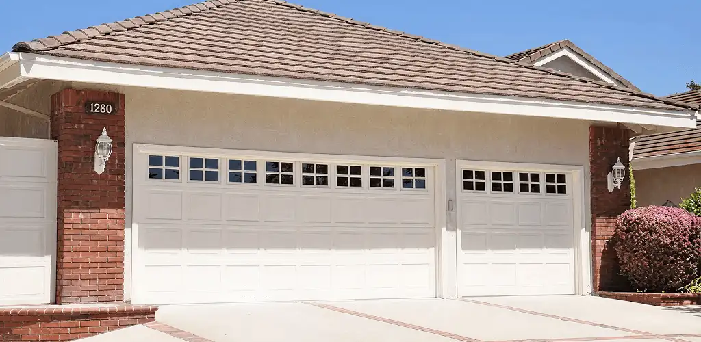 Residential garage door repair service for a double garage door in Knoxville, TN