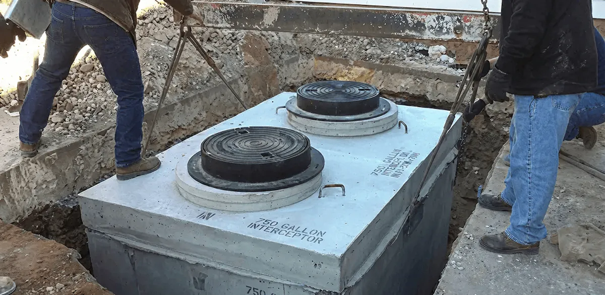 Grease trap installation for a commercial property drainage system in Knoxville, TN
