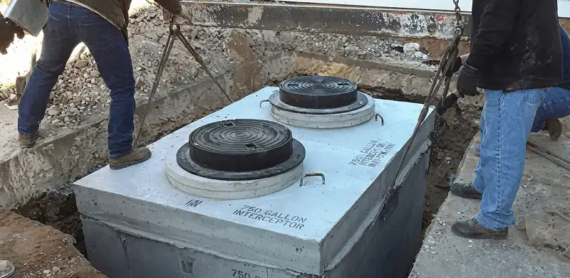 Grease trap installation for a commercial property drainage system in Knoxville, TN