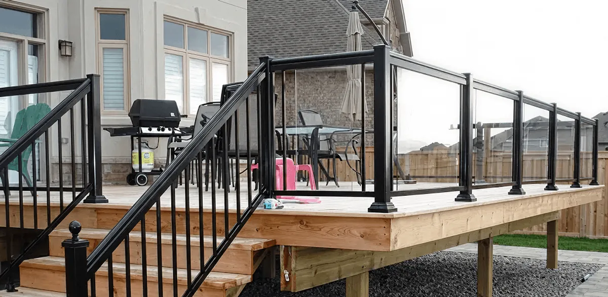 Handrail installation on a deck staircase for safety and code compliance in Knoxville, TN